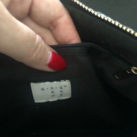 A New Day black & tan woven clutch bag with side pom-poms. - Picture 4 of 4